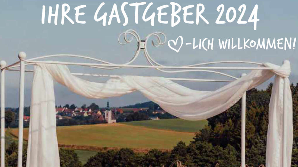 Himmelbett auf der Wiese, im Hintergrund Bad Neualbenreuth, Titelbild Gastgeberverzeichnis
